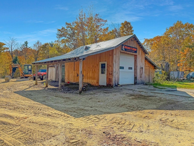 450 Greenwoods Rd, Peru, ME 04290 - view of outbuilding featuring dirt driveway and an outbuilding