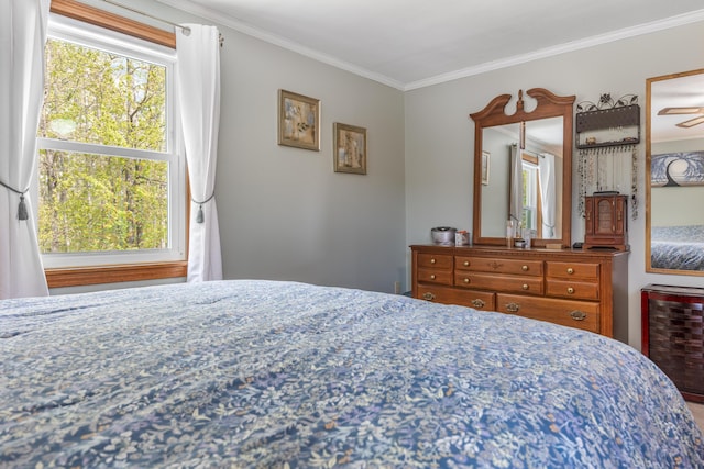 bedroom with crown molding, multiple windows, and wine cooler