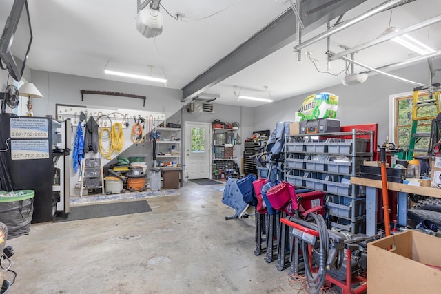 garage featuring a garage door opener