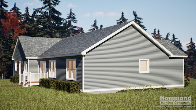 LOT3 Chase Ln, Lewiston, ME 04240 - view of side of home with a lawn and a shingled roof