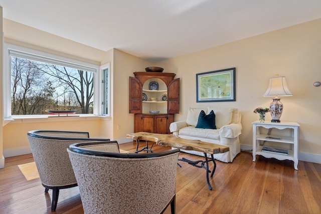 18 Pleasant St, Newcastle, ME 04553 - living area featuring hardwood / wood-style floors and baseboards