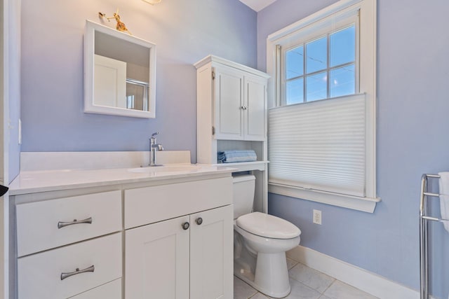18 Pleasant St, Newcastle, ME 04553 - full bathroom with vanity, toilet, baseboards, a shower, and tile patterned floors