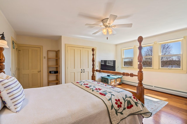 18 Pleasant St, Newcastle, ME 04553 - bedroom with wood finished floors, a closet, ceiling fan, and baseboard heating