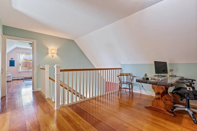 18 Pleasant St, Newcastle, ME 04553 - office area with hardwood / wood-style flooring, vaulted ceiling, and a baseboard radiator