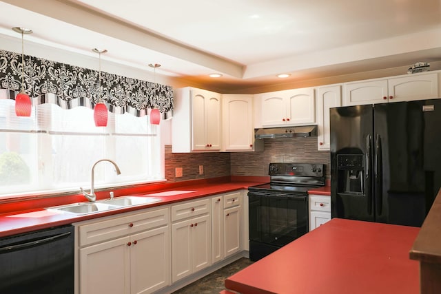 24 Lincoln St, Ellsworth, ME 04605 - kitchen with a sink, white cabinets, black appliances, under cabinet range hood, and tasteful backsplash
