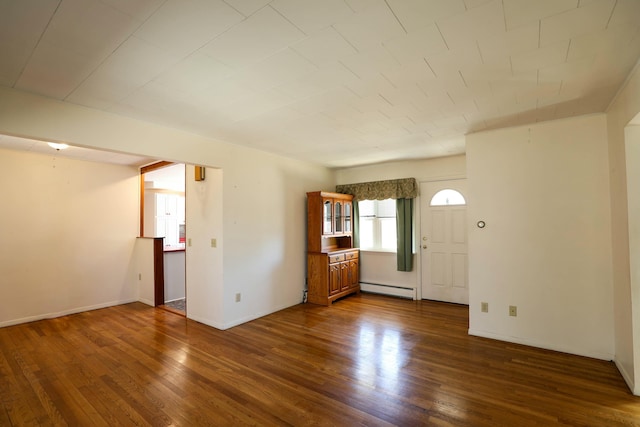 24 Lincoln St, Ellsworth, ME 04605 - interior space with a baseboard heating unit and dark wood finished floors