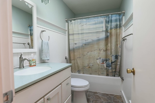 24 Lincoln St, Ellsworth, ME 04605 - bathroom with toilet, shower / tub combo with curtain, vanity, and stone finish flooring