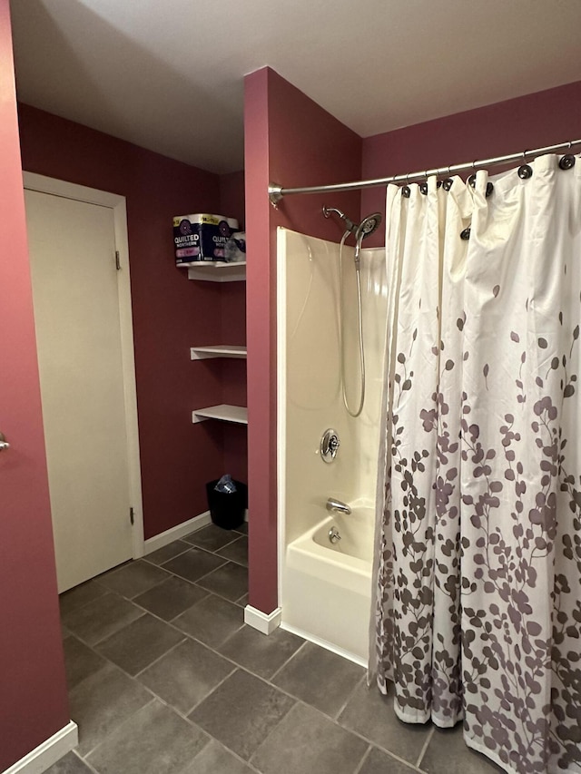 full bath with shower / tub combo and tile patterned flooring