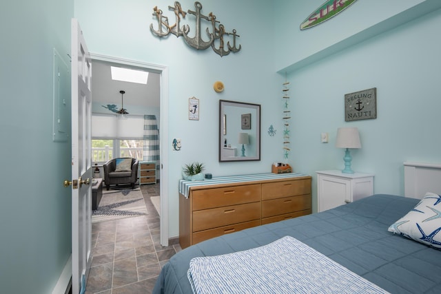 bedroom featuring stone finish floor