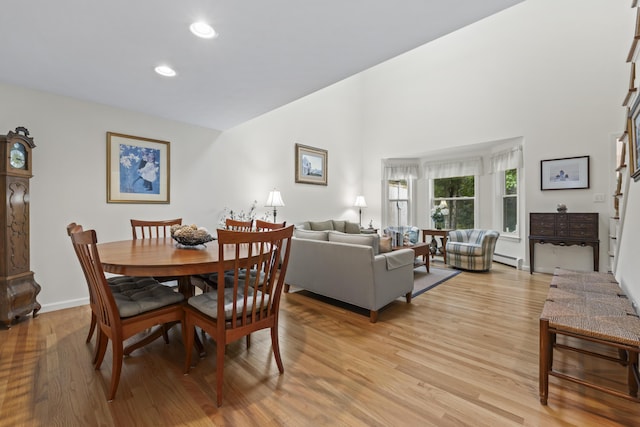 48 Windward Pointe Dr Unit 48, Wells, ME 04090 - dining space with baseboards, light wood-type flooring, baseboard heating, and recessed lighting