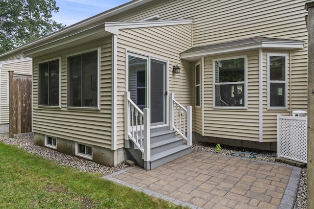 48 Windward Pointe Dr Unit 48, Wells, ME 04090 - back of house featuring entry steps and a patio area