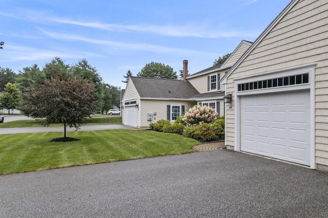48 Windward Pointe Dr Unit 48, Wells, ME 04090 - view of front facade with roof with shingles and a front yard
