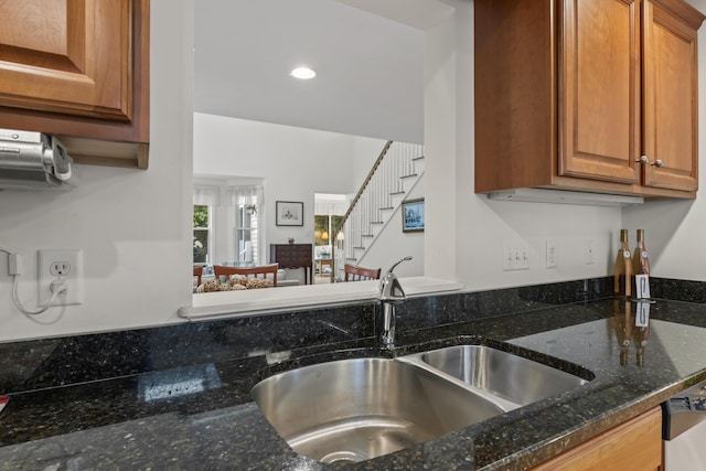 48 Windward Pointe Dr Unit 48, Wells, ME 04090 - kitchen featuring dark stone countertops, a sink, brown cabinetry, dishwasher, and recessed lighting