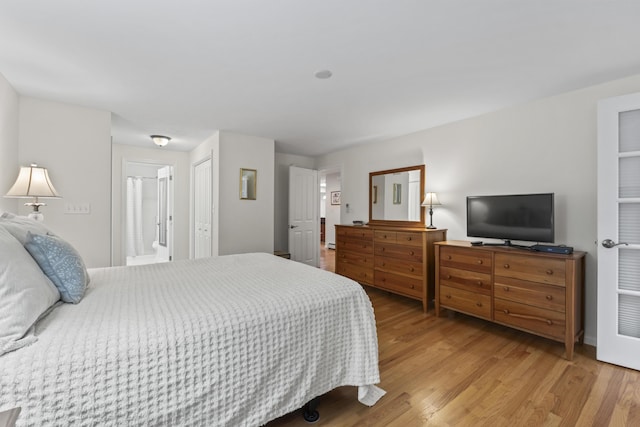 48 Windward Pointe Dr Unit 48, Wells, ME 04090 - bedroom featuring light wood finished floors and connected bathroom