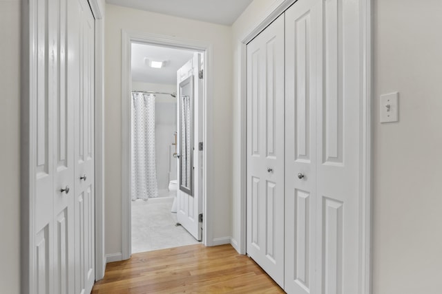 48 Windward Pointe Dr Unit 48, Wells, ME 04090 - hall with baseboards and light wood-type flooring