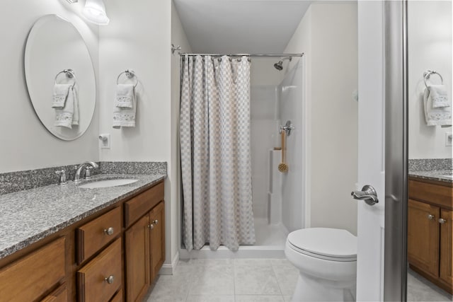 48 Windward Pointe Dr Unit 48, Wells, ME 04090 - bathroom with toilet, tile patterned flooring, vanity, and a shower stall