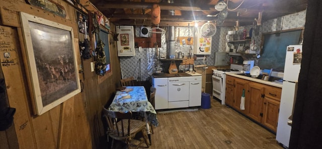 574 Half Township Rd, Lincoln, ME 04457 - kitchen featuring brown cabinetry, white appliances, open shelves, and wood finished floors