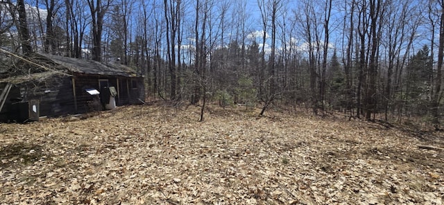574 Half Township Rd, Lincoln, ME 04457 - view of yard featuring an outbuilding