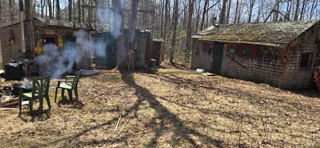 574 Half Township Rd, Lincoln, ME 04457 - view of yard featuring an outbuilding