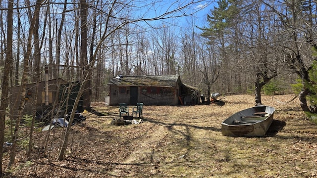 574 Half Township Rd, Lincoln, ME 04457 - view of yard featuring an outbuilding
