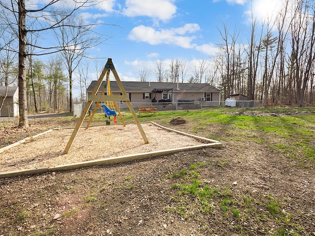 community jungle gym with fence
