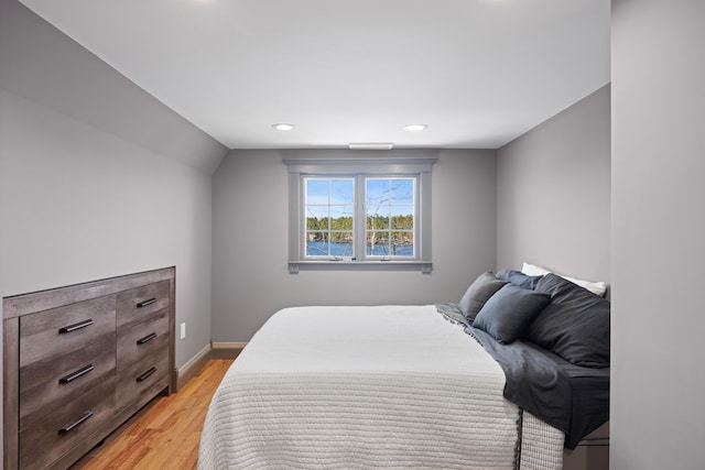 bedroom featuring recessed lighting, baseboards, and light wood-style floors