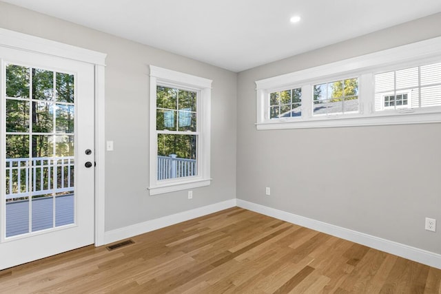 77 Creeks Edge Dr Unit 0, Saco, ME 04072 - doorway to outside featuring recessed lighting, baseboards, visible vents, and light wood-style flooring