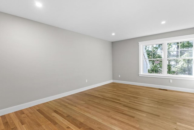 77 Creeks Edge Dr Unit 0, Saco, ME 04072 - unfurnished room with baseboards, recessed lighting, and light wood-style flooring