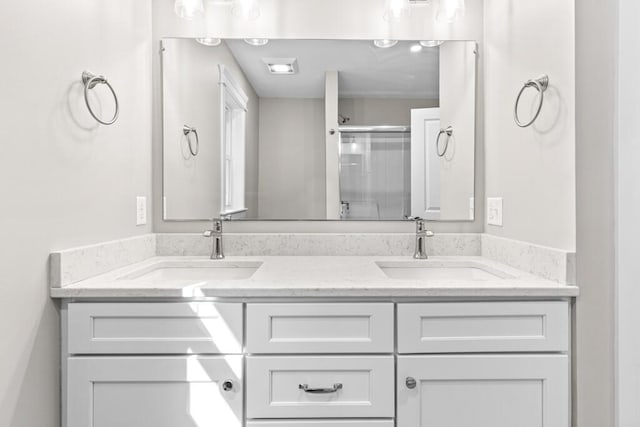 77 Creeks Edge Dr Unit 0, Saco, ME 04072 - full bath featuring double vanity, a sink, and a stall shower