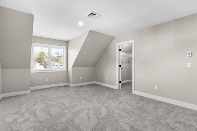 77 Creeks Edge Dr Unit 0, Saco, ME 04072 - additional living space featuring visible vents, carpet flooring, baseboards, and lofted ceiling