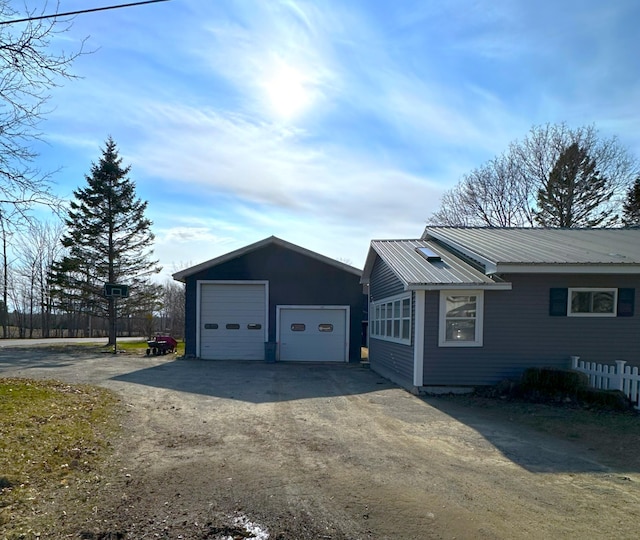 6 Ridge Rd, Corinth, ME 04427 - view of home's exterior with a detached garage and metal roof