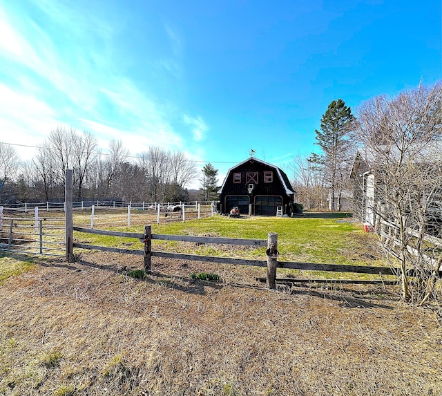 6 Ridge Rd, Corinth, ME 04427 - view of yard with an outbuilding, a barn, fence, a garage, and a rural view