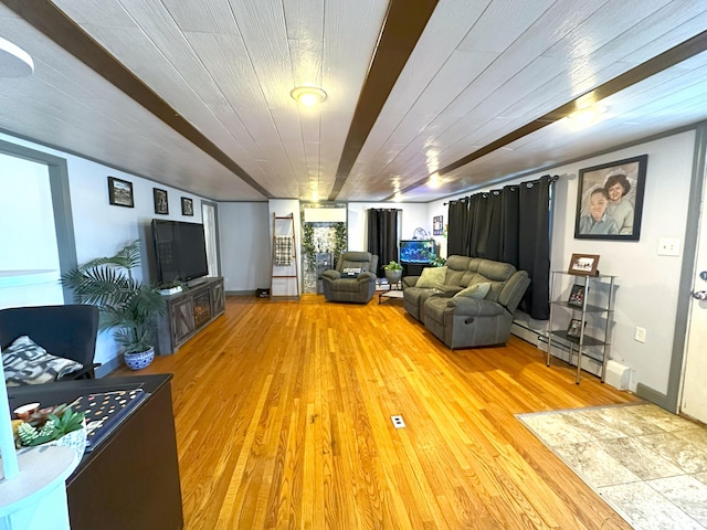6 Ridge Rd, Corinth, ME 04427 - living room with a baseboard heating unit, baseboards, and light wood finished floors