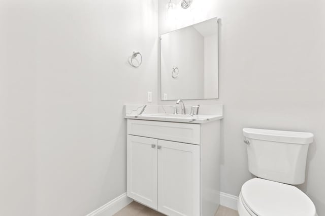 193 Stewart Dr Unit 0, Scarborough, ME 04074 - half bath with baseboards, vanity, and toilet