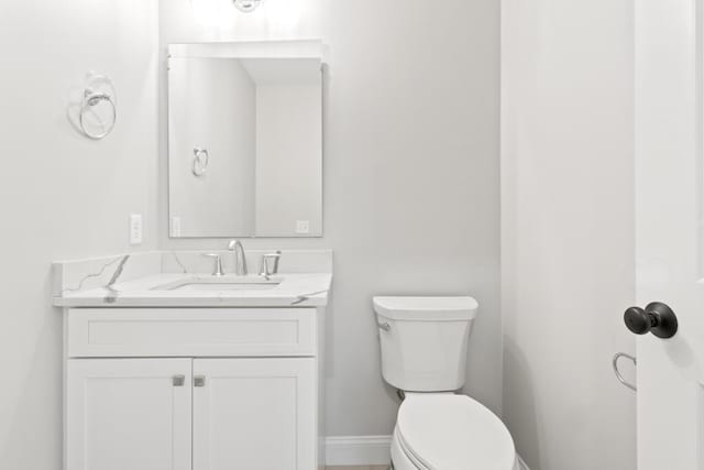 193 Stewart Dr Unit 0, Scarborough, ME 04074 - half bath with vanity, baseboards, and toilet