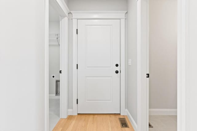193 Stewart Dr Unit 0, Scarborough, ME 04074 - entryway with baseboards, visible vents, and light wood-style flooring
