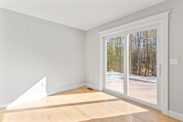 193 Stewart Dr Unit 0, Scarborough, ME 04074 - spare room with baseboards, visible vents, and wood finished floors
