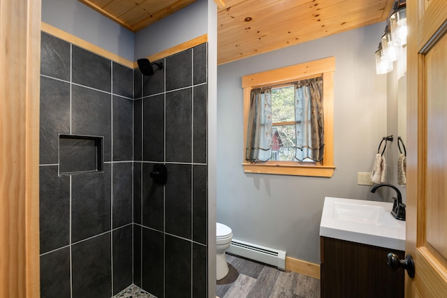 bathroom featuring baseboard heating, wood finished floors, tiled shower, and wood ceiling