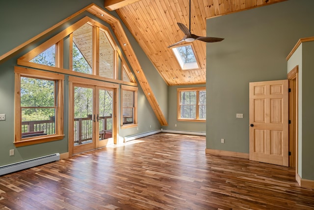 unfurnished living room with wood finished floors, ceiling fan, and high vaulted ceiling