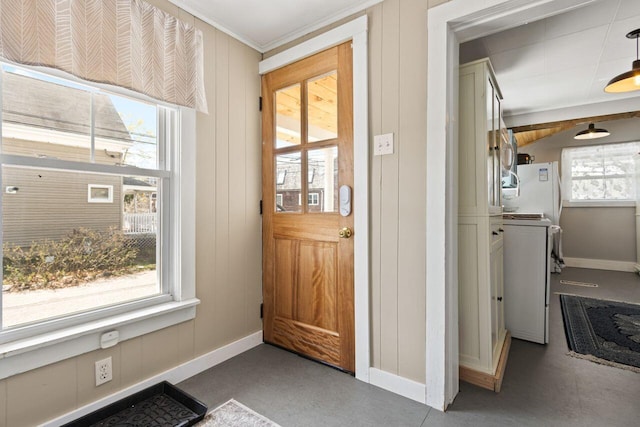 15 Longwood Ave, Old Orchard Beach, ME 04064 - doorway featuring baseboards and a decorative wall