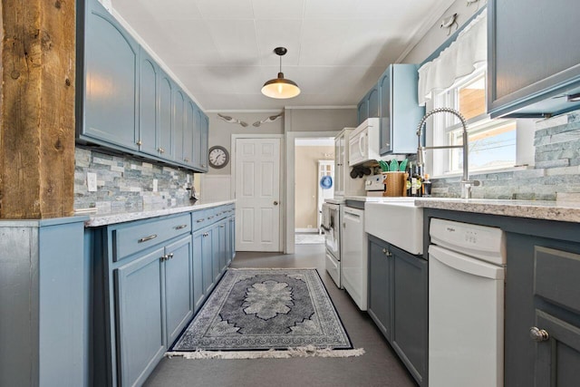 15 Longwood Ave, Old Orchard Beach, ME 04064 - kitchen with blue cabinets, pendant lighting, white appliances, and tasteful backsplash