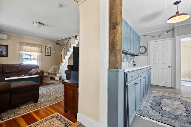 15 Longwood Ave, Old Orchard Beach, ME 04064 - interior space with stairs, dark wood finished floors, and a wall mounted air conditioner