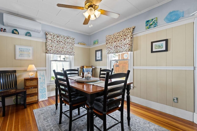15 Longwood Ave, Old Orchard Beach, ME 04064 - dining space featuring wood-type flooring, ceiling fan, and ornamental molding