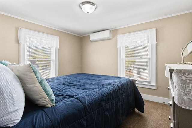 15 Longwood Ave, Old Orchard Beach, ME 04064 - bedroom with crown molding, carpet floors, baseboards, and a wall unit AC
