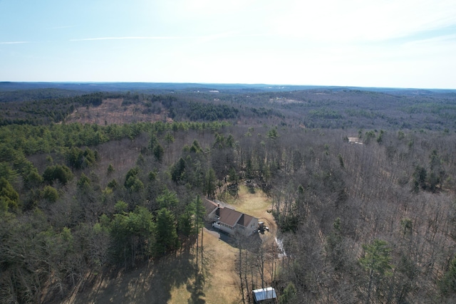 drone / aerial view with a view of trees
