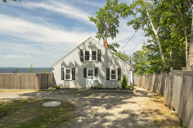 1485 Richville Rd, Standish, ME 04084 - rear view of house with a chimney
