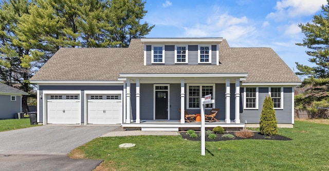 12 Black Sparrow Dr, Portland, ME 04102 - traditional-style home featuring covered porch, a garage, driveway, roof with shingles, and a front yard