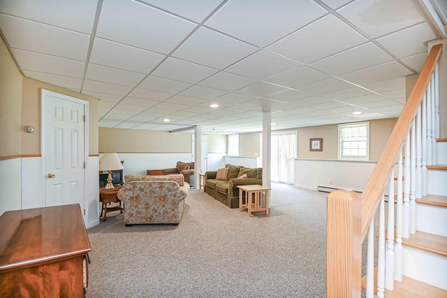 living area featuring stairs, recessed lighting, and carpet
