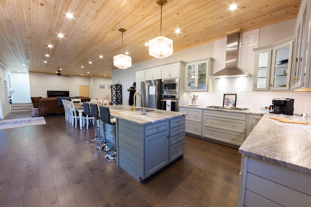 3 Bogue Chitto Ln Unit 1, Bar Harbor, ME 04609 - kitchen with open floor plan, recessed lighting, wall chimney exhaust hood, dark wood finished floors, and appliances with stainless steel finishes
