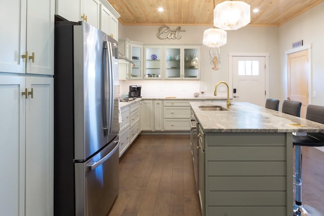 3 Bogue Chitto Ln Unit 1, Bar Harbor, ME 04609 - kitchen with a breakfast bar, a sink, freestanding refrigerator, recessed lighting, and wooden ceiling